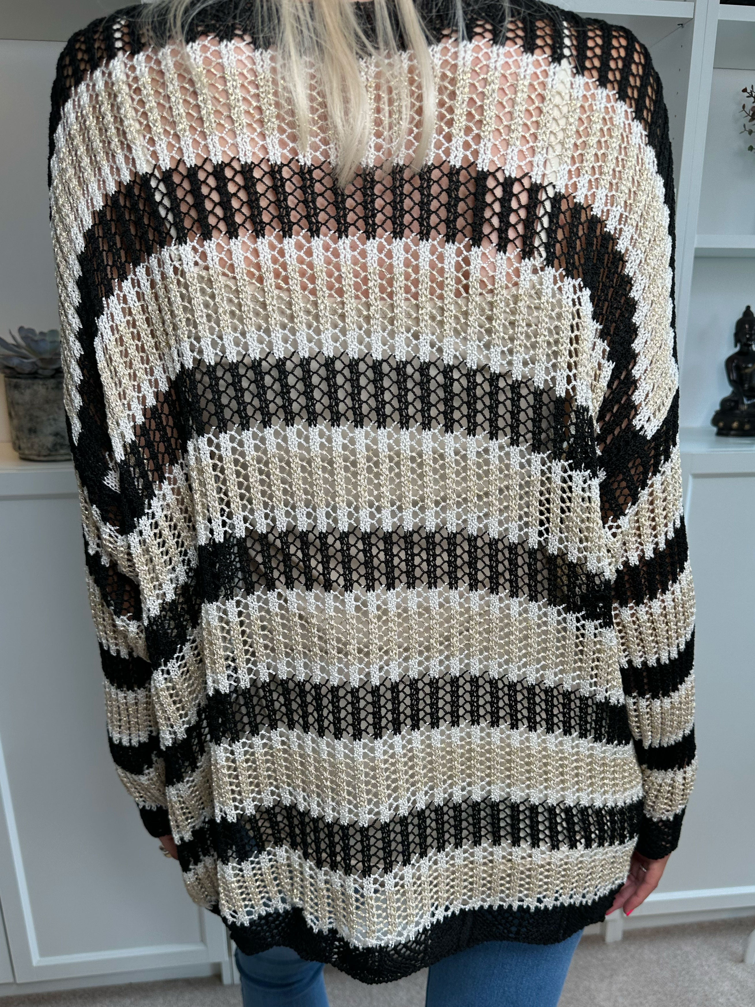 Ania - Randig stickad blus med hål